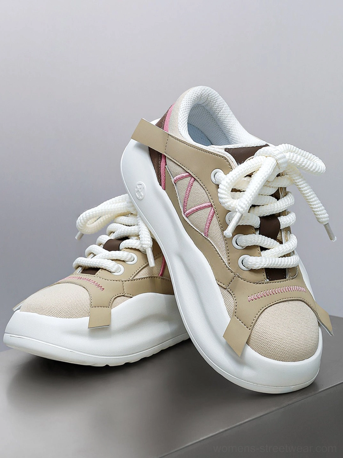 Product gallery image highlighting the layered look of the geometric panel platform runner sneakers