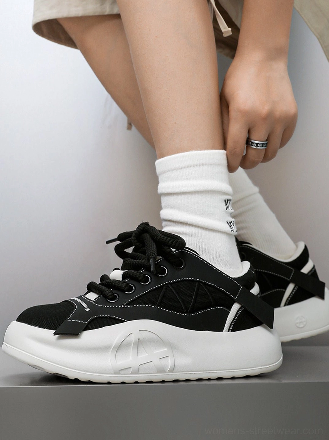 Product gallery image for geometric panel platform runner sneakers with asymmetrical overlays and a sculpted sole