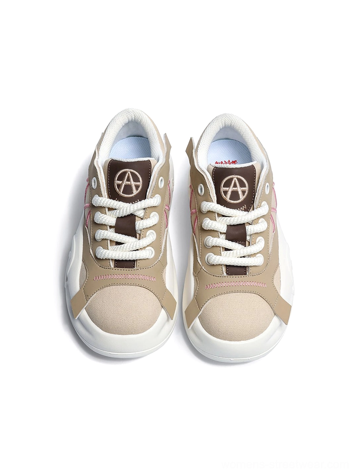 Gallery image of geometric panel platform runner sneakers featuring their sculpted sole and low-top shape