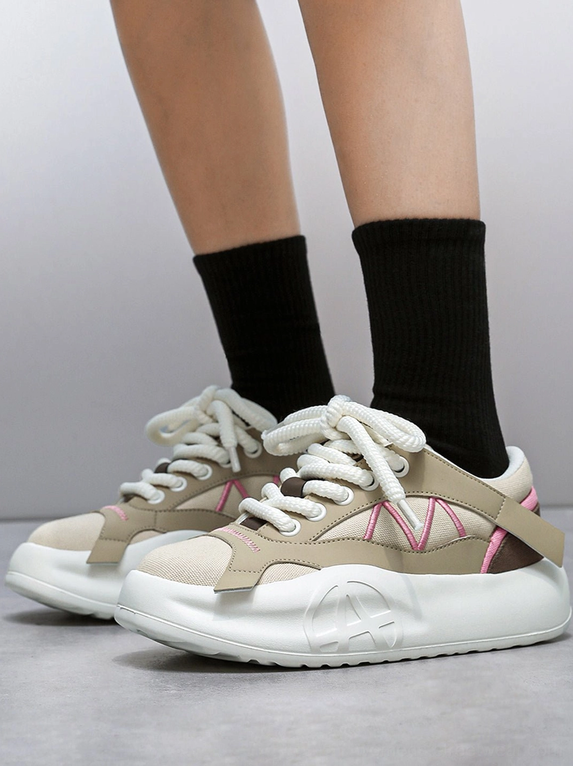 Additional product gallery image of the geometric panel platform runner sneakers with angular side detailing
