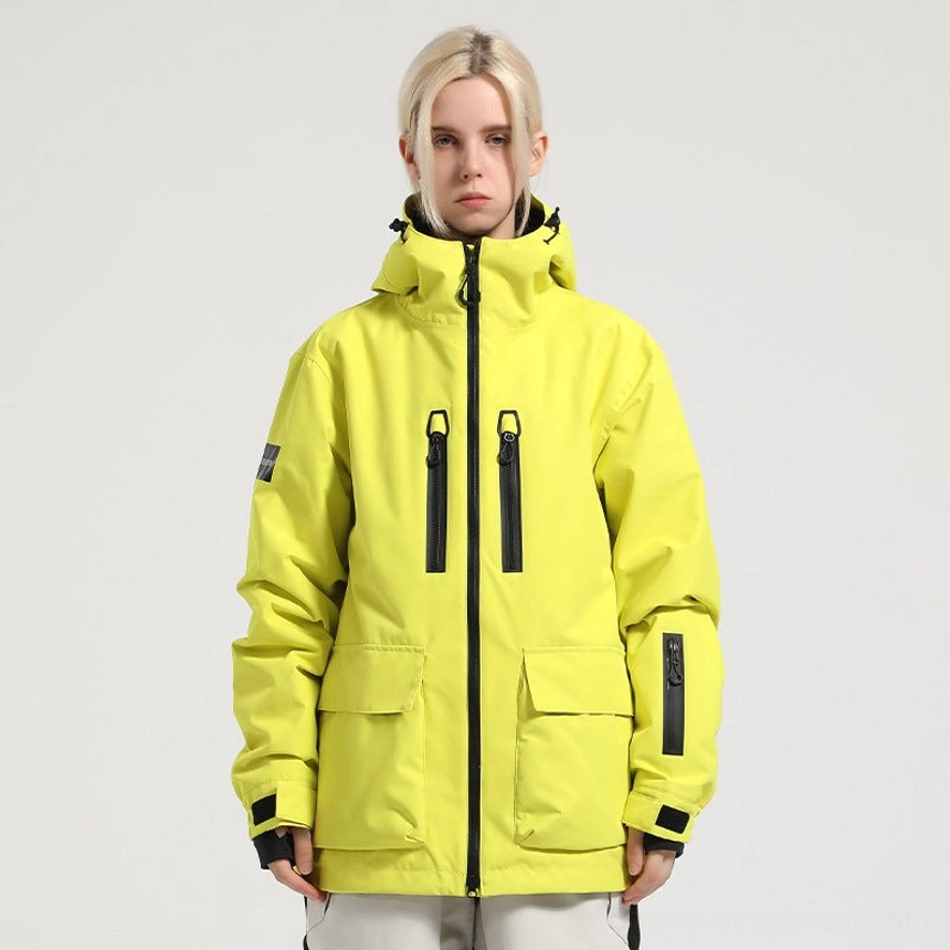 Neon yellow Glacier Drift unisex ski jacket with standard snowboarding silhouette attached hood black utility pockets and adjustable cuffs