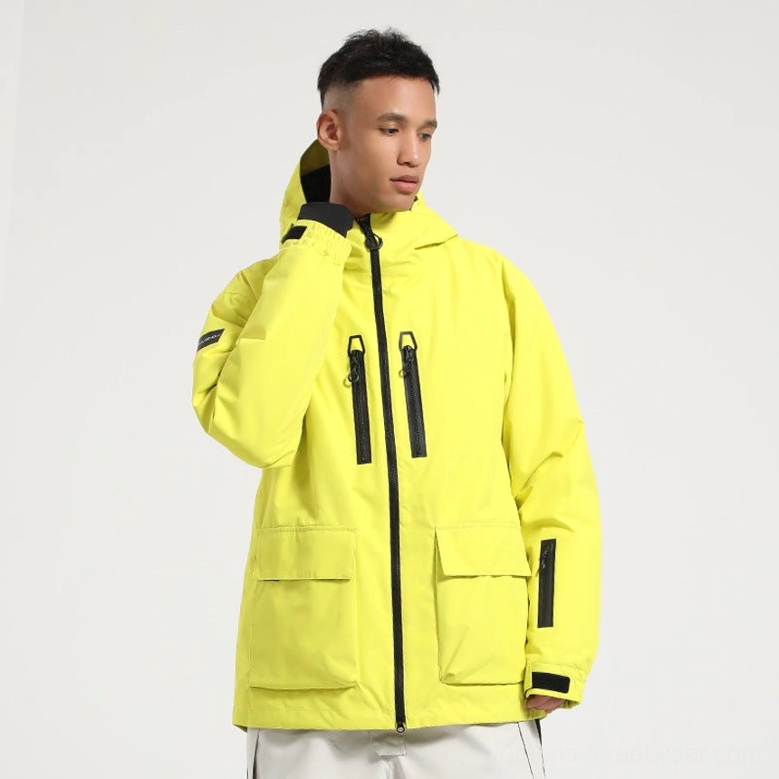 Neon yellow Glacier Drift unisex snowboard jacket with black waterproof-style zippers adjustable hood cuffs and multiple utility pockets