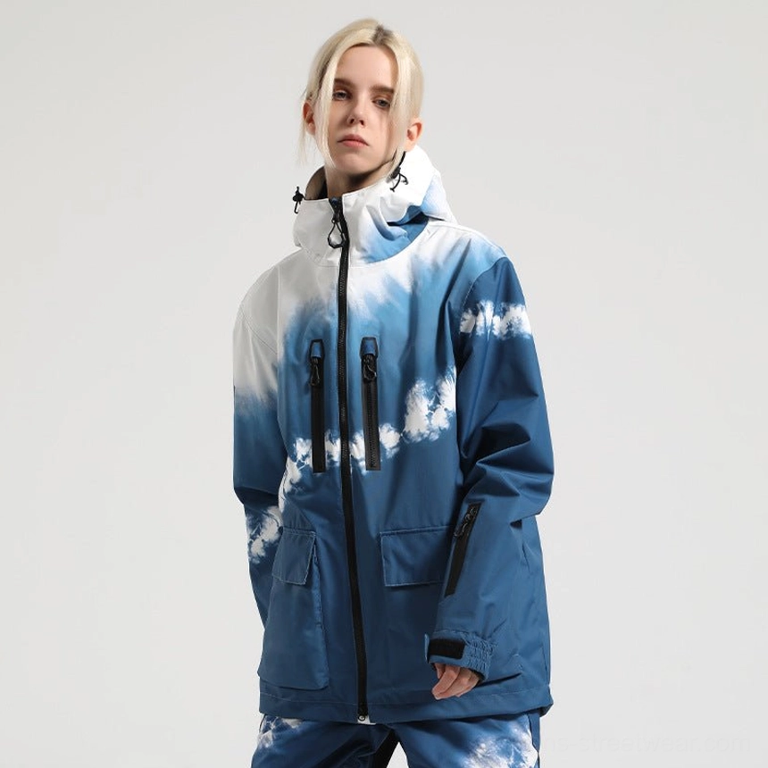 Blue and white cloud print Glacier Drift unisex techwear snowboard jacket with adjustable hood black zippers and utility cargo pockets shown from the front three quarter view