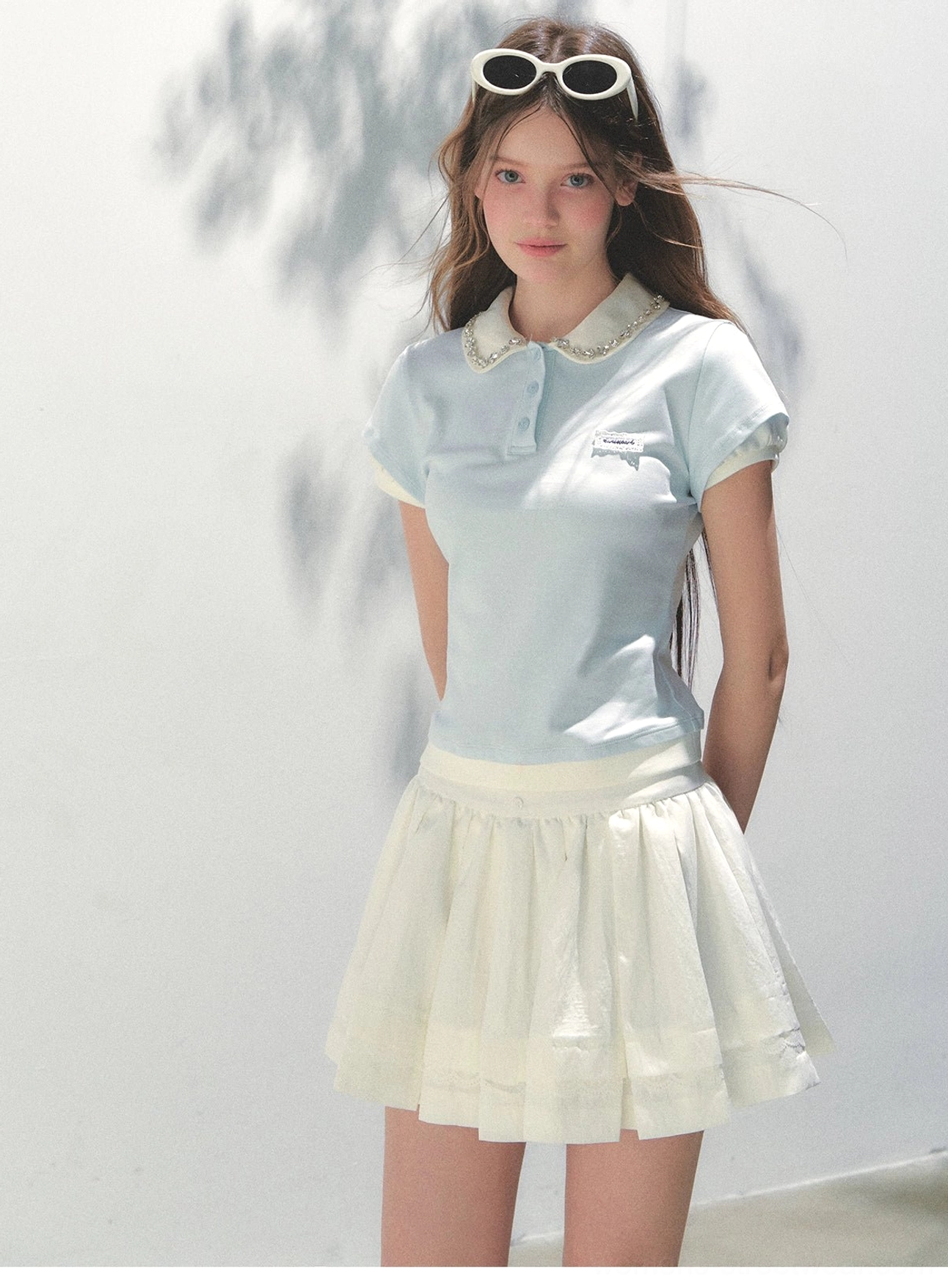 Glass blue lace collar cotton polo top back side view showing fitted silhouette and delicate Peter Pan collar