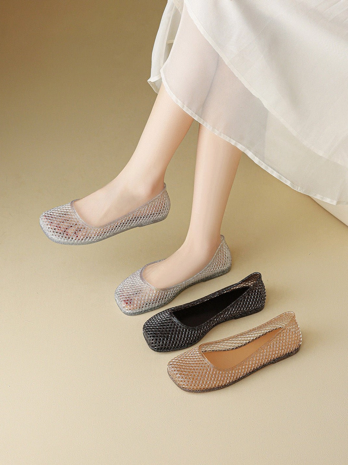 Close-up view of glitter mesh jelly ballet flat texture and low flexible sole