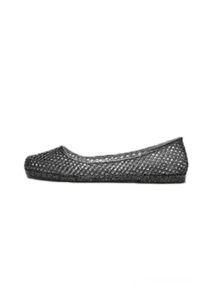 Side profile of black glitter mesh jelly ballet flat with rounded toe and woven slip-on upper