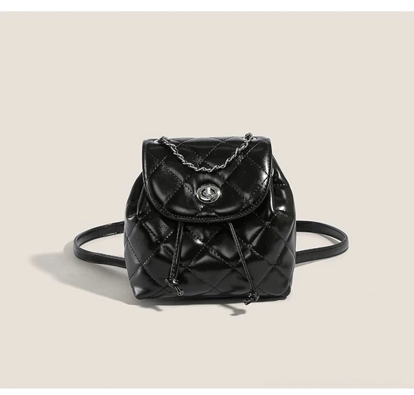 Black glossy quilted chain mini backpack with silver twist lock for women streetwear