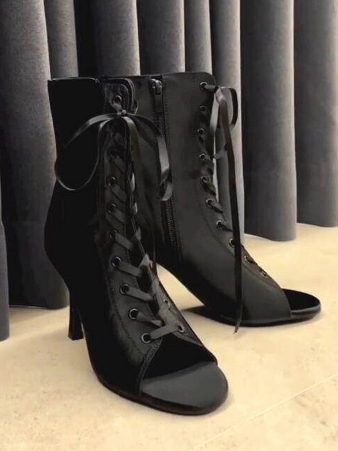 Glossy satin lace-up ankle heels with peep-toe front for contemporary partywear and statement outfits