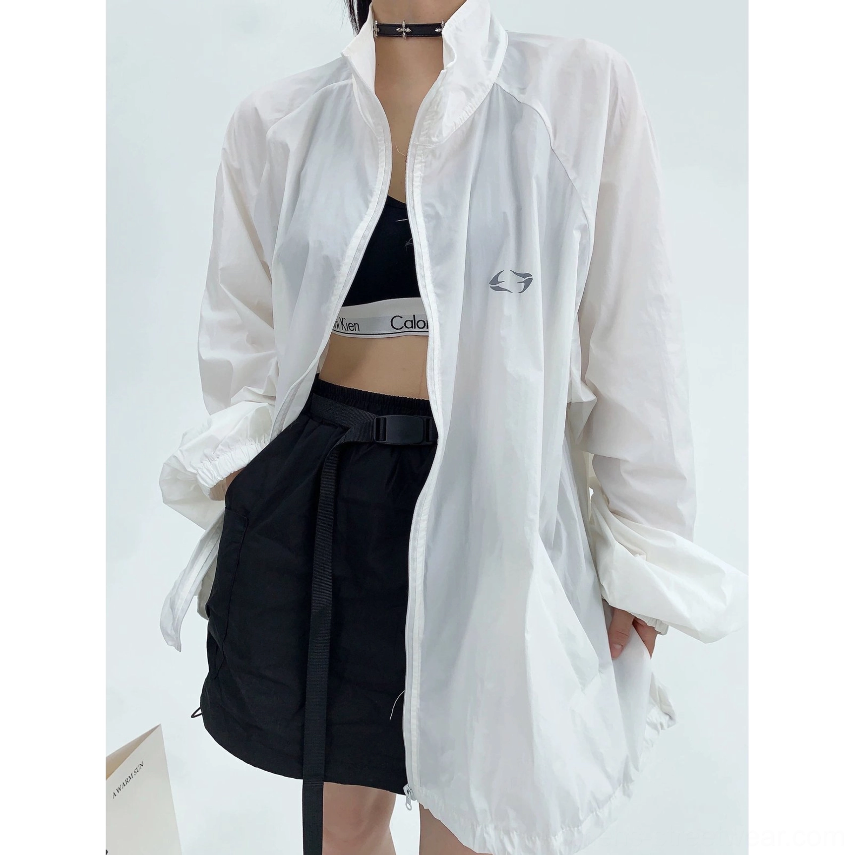 Gorpcore-inspired lightweight windbreaker jacket product image with oversized fit, UPF50+ sun protection, high collar, and practical everyday layering design