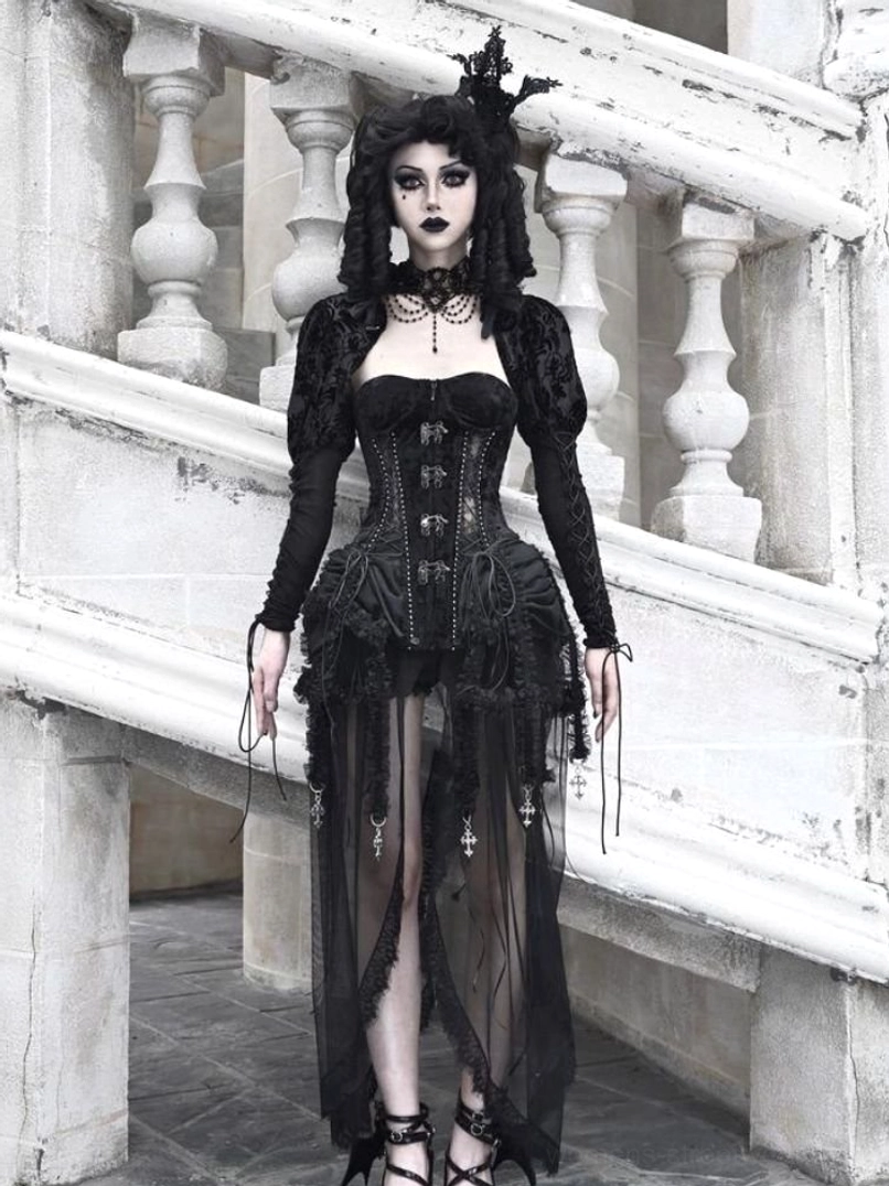 Full front view of gothic birdcage corset three-piece set styled with sheer long sleeves floor-length tulle and choker