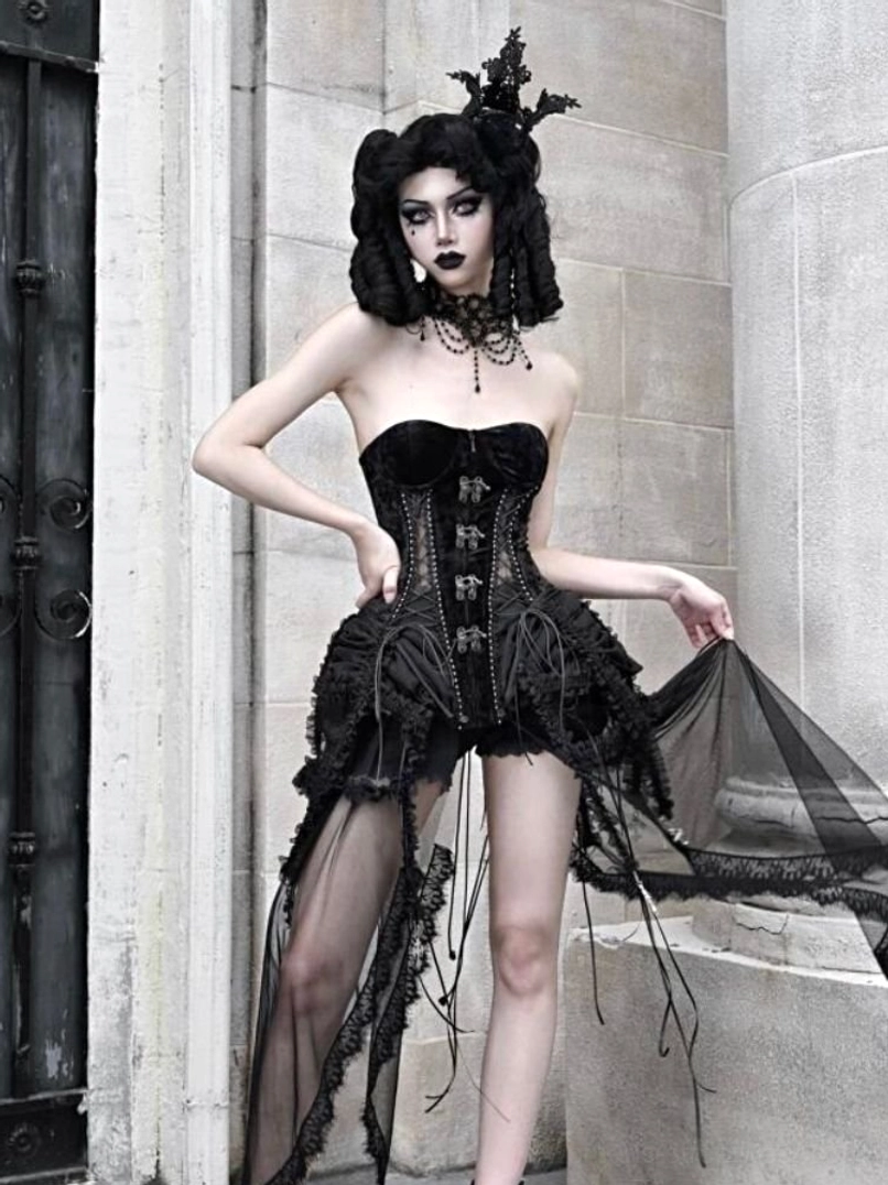 Full front view of gothic black birdcage corset three-piece set with sculpted bodice and flowing sheer tulle train