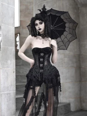 Three-quarter view of gothic birdcage corset set with black ruffled tulle layers and dark romance styling