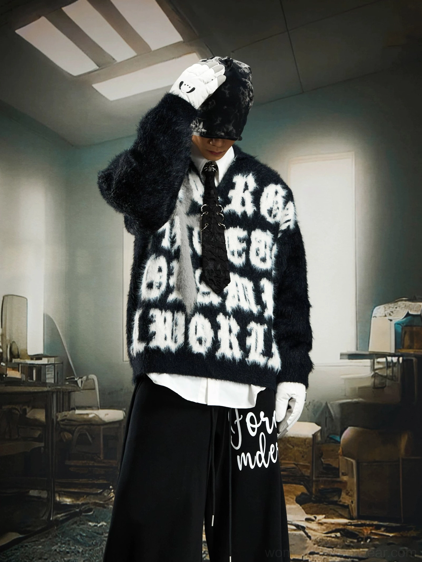 Gothic cross fuzzy jacquard sweater product image showing its oversized streetwear silhouette and textured knit construction