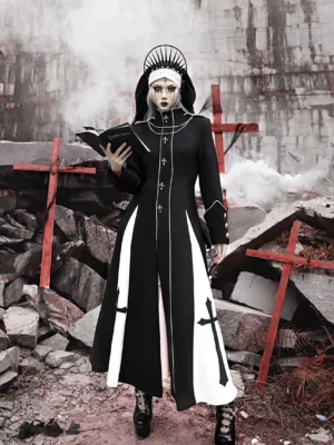 Front full-body view of black and white gothic cross long trench coat with fitted waist, stand collar, cross buttons, white piping, and embroidered side panels