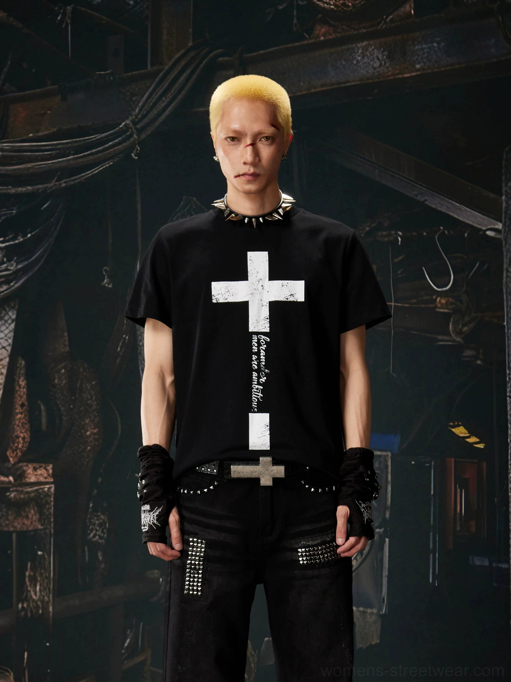 Black distressed cross graphic streetwear T-shirt front view styled with studded gloves and dark workwear
