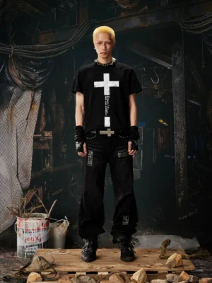 Black Gothic cross script graphic cotton streetwear T-shirt full front view on male model with dark workwear outfit