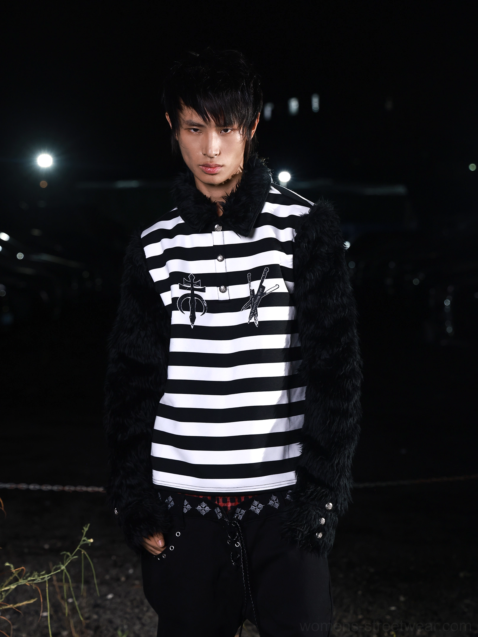 Front detail of gothic faux fur striped long sleeve shirt showing the plush collar, half-placket buttons, chest sigil embroidery, and metal cuff accents