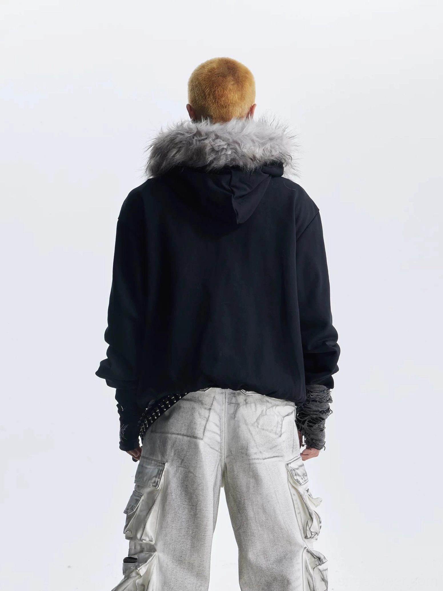 Back view of black gothic faux fur trim hoodie showing plain black sweatshirt body and fluffy hood trim