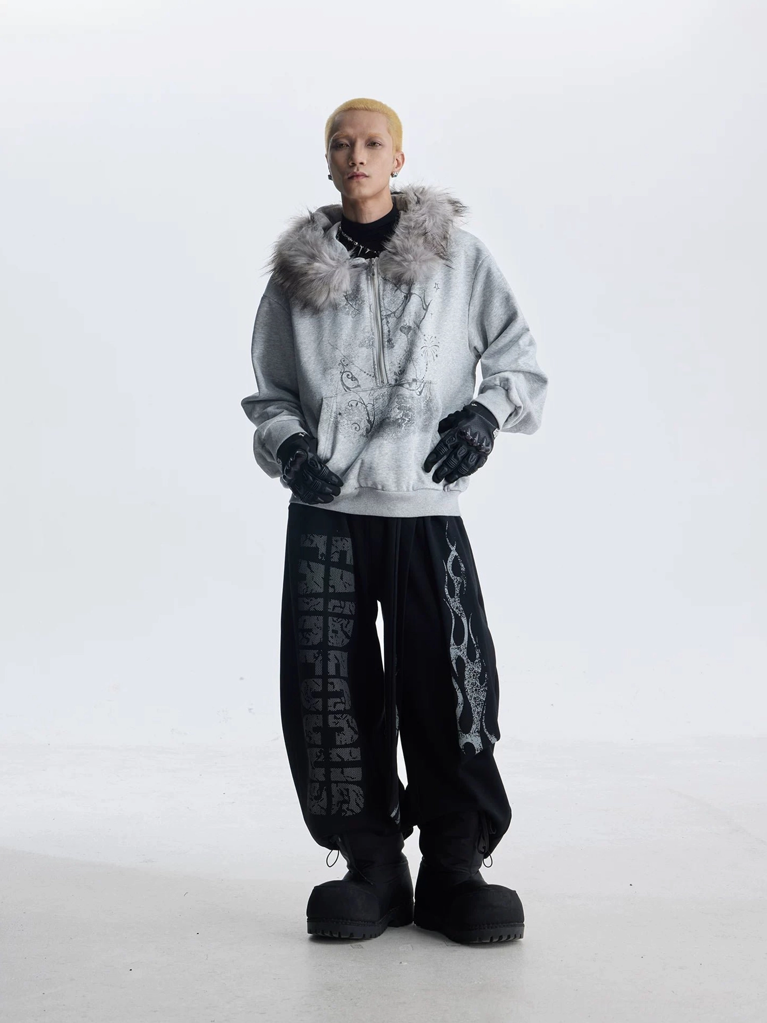 Gray gothic faux fur trim graphic zip hoodie full body front view with flame print wide leg pants