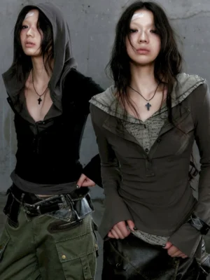Gothic hooded Henley streetwear top styled with cargo pants in an industrial concrete setting
