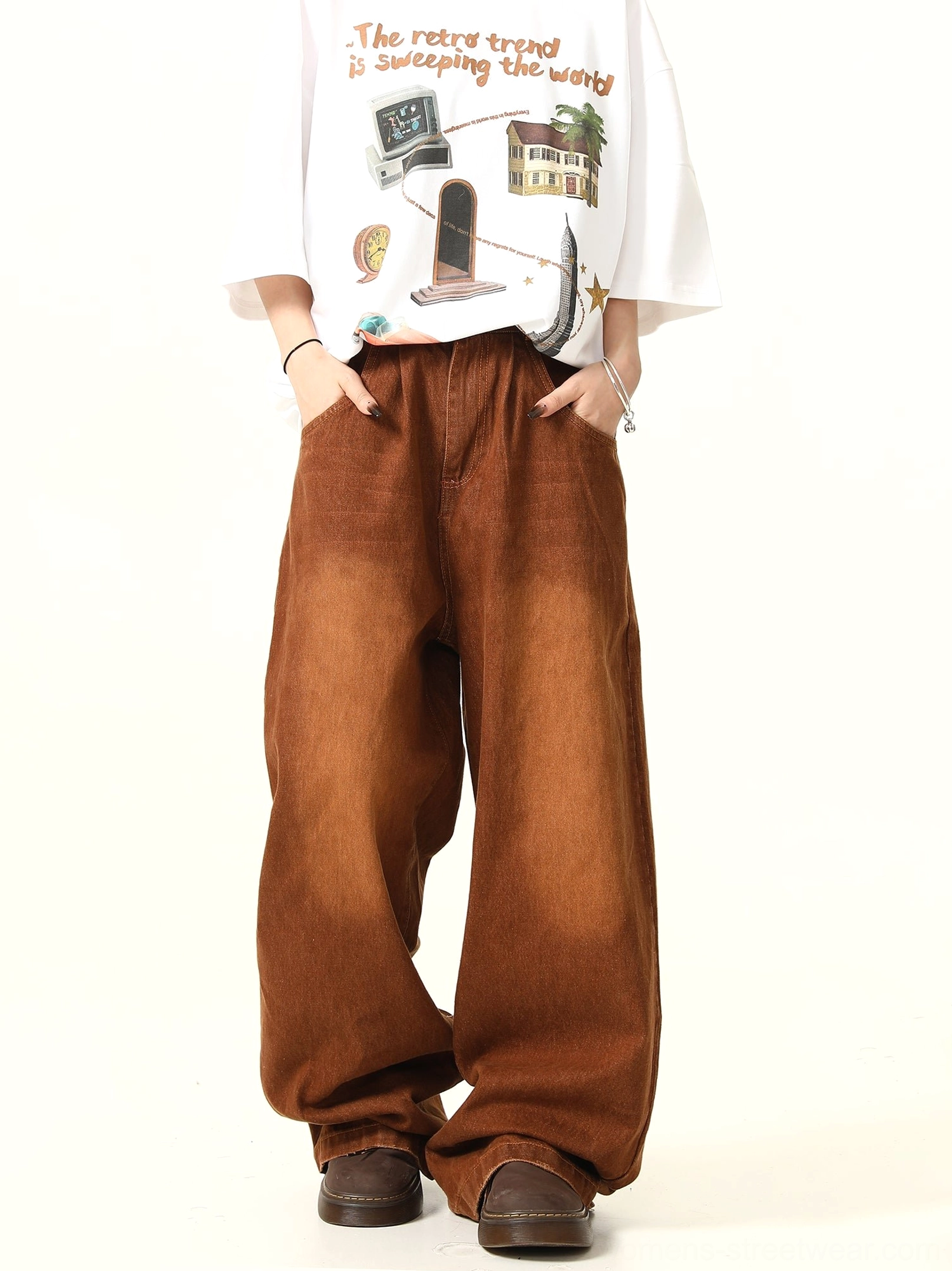 Front view of gradient washed brown wide leg denim pants with classic pockets and relaxed streetwear styling