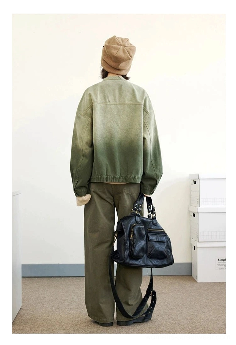 Back view of green gradient washed denim flight jacket with clean faded denim finish