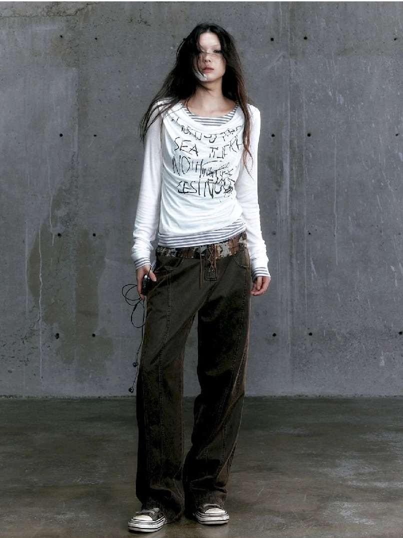 Graffiti layered long sleeve top with asymmetric streetwear styling