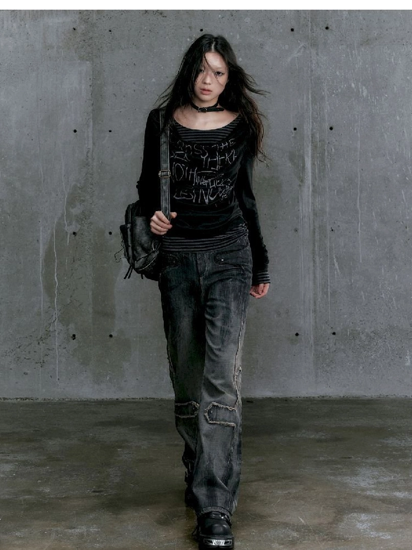 Graffiti layered long sleeve top with striped underlayer fashion detail