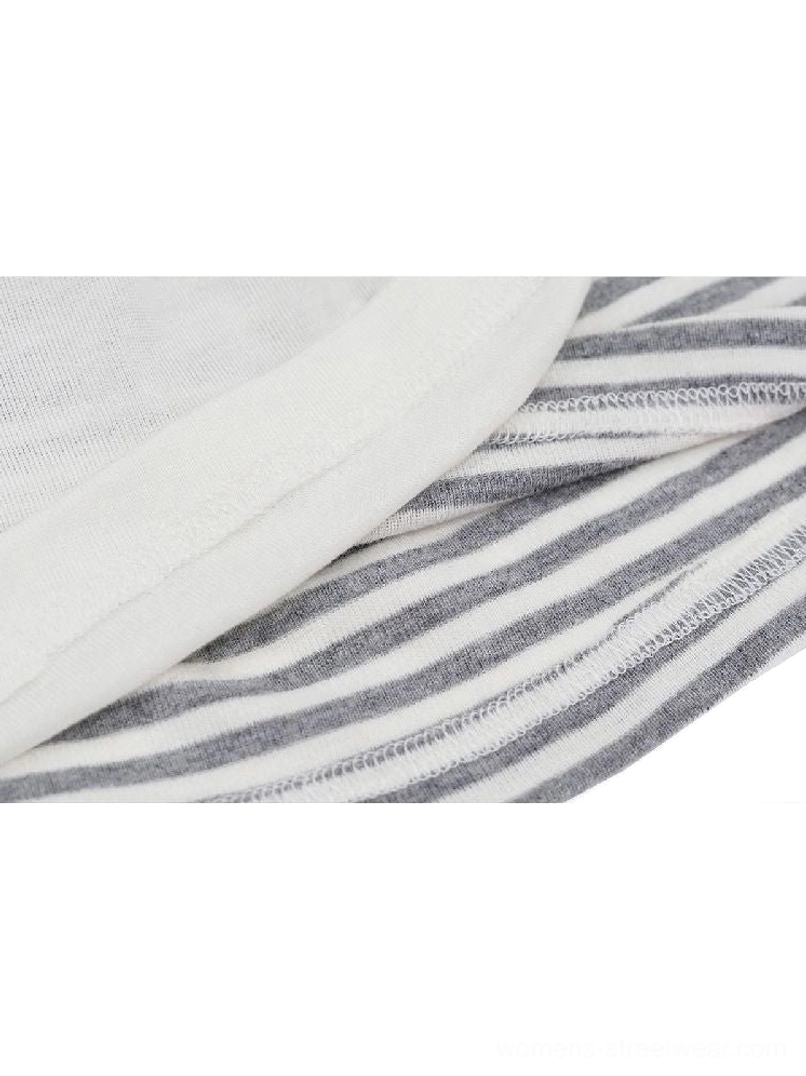 Graffiti layered long sleeve top with striped underlayer fashion product image