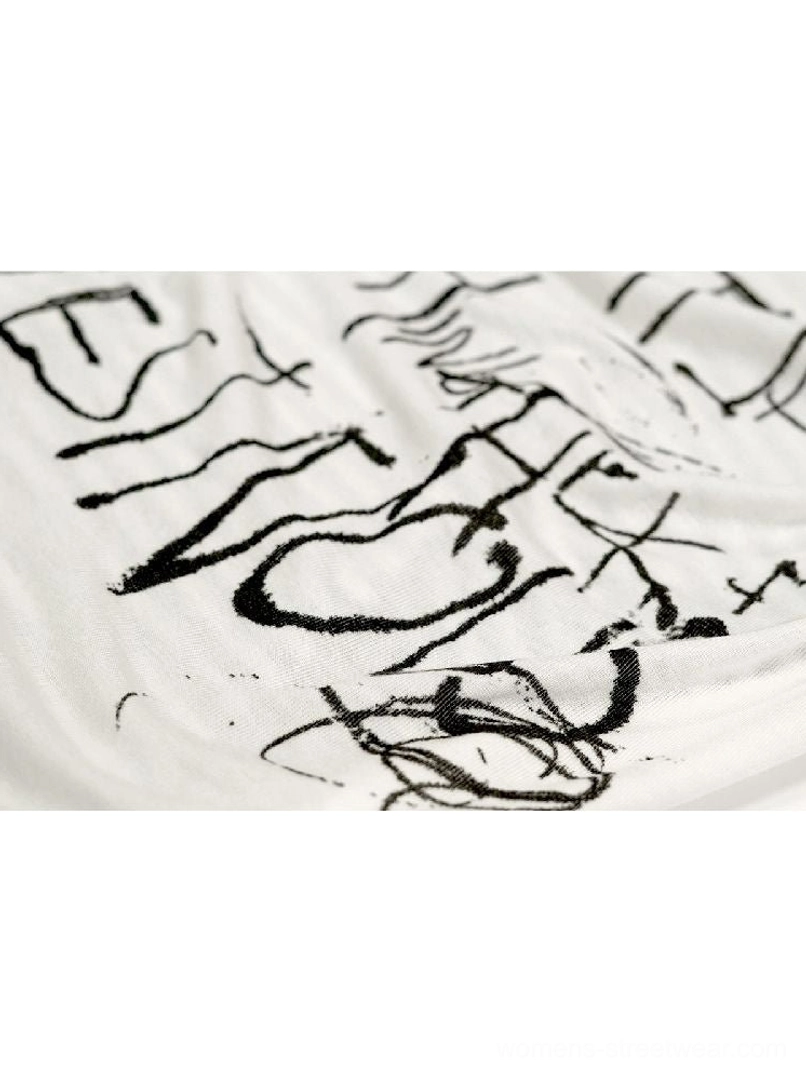 Graffiti layered long sleeve top striped underlayer style detail
