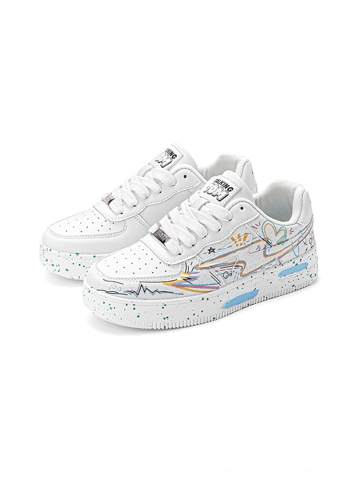 Front three-quarter view of white graffiti lightning low-top court sneakers with perforated toe boxes and speckled midsoles