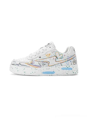 White graffiti lightning low-top court sneakers with colorful abstract doodle print and speckled blue accent sole side profile