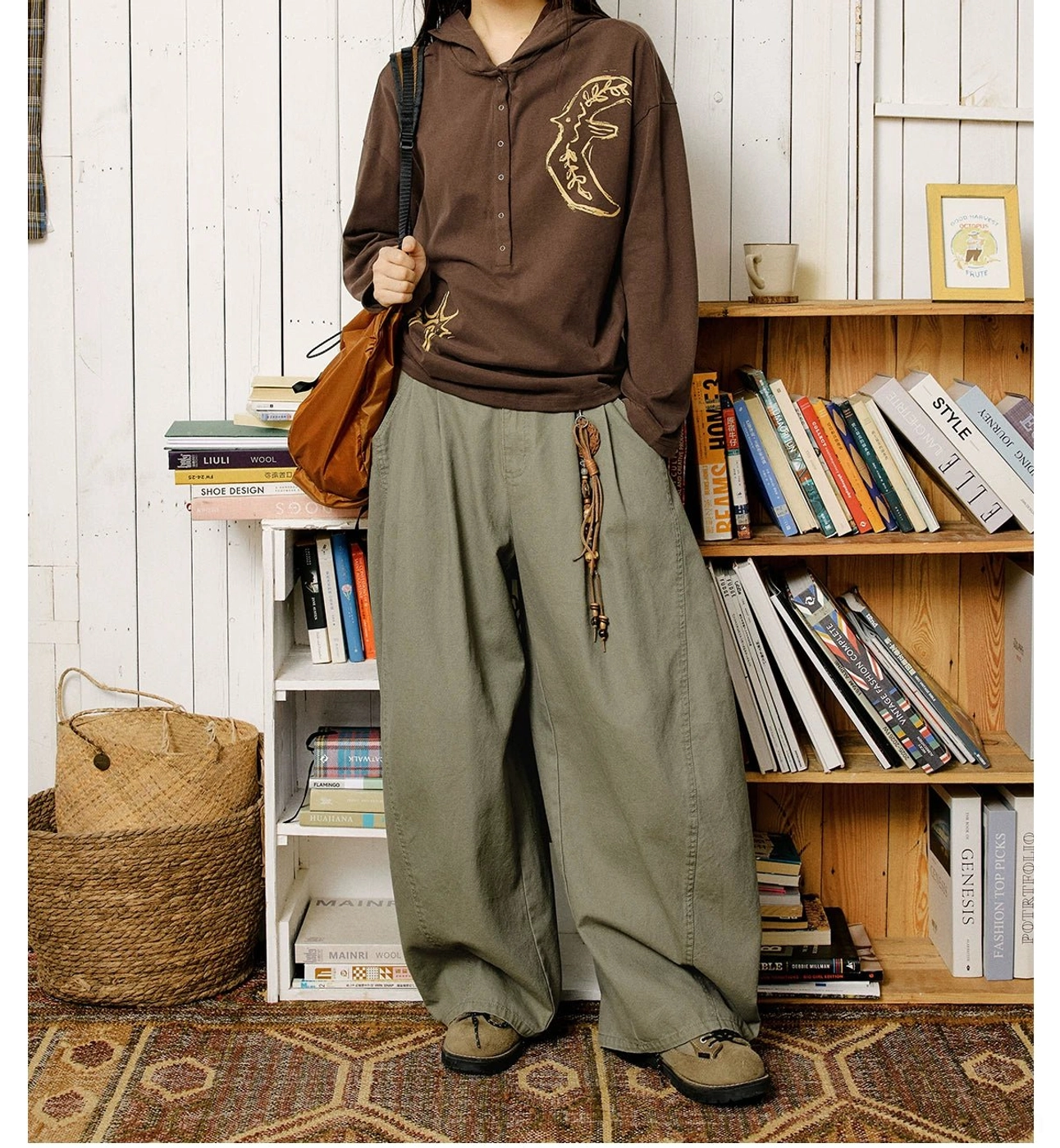 Graphic embroidered oversized polo shirt designed for layered Korean fashion and contemporary East Asian streetwear looks