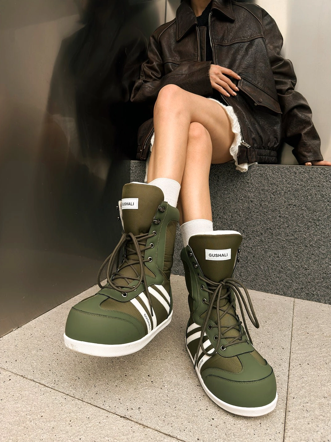 Graphic fleece-lined lace-up mid-calf snow boots detailed product view for winter streetwear styling