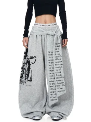 Heather gray graphic wrap panel ultra wide leg streetwear sweatpants front full body view with retro leg print