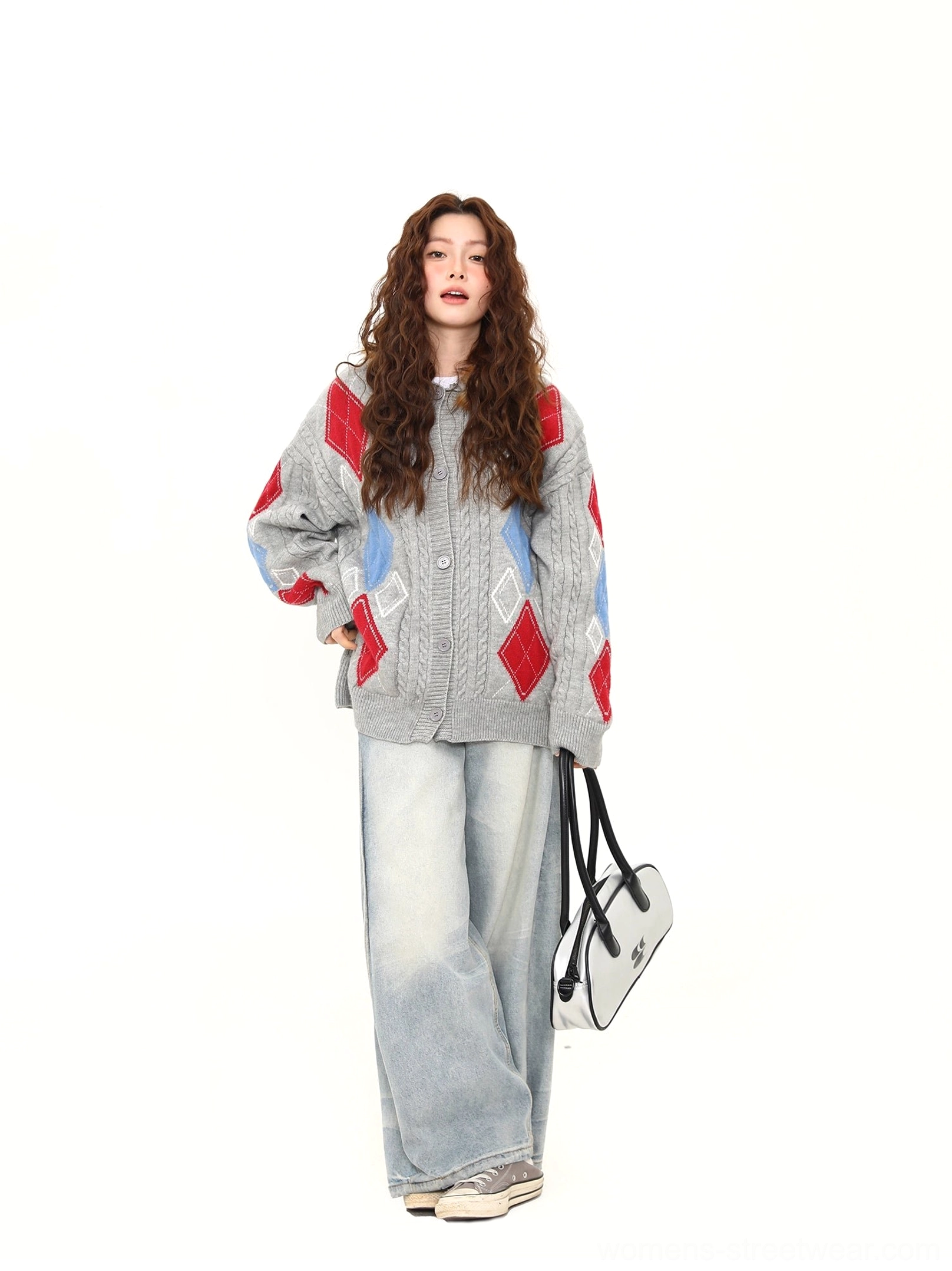 Gray oversized argyle cable knit button front cardigan styled with light wash wide leg denim in a streetwear outfit