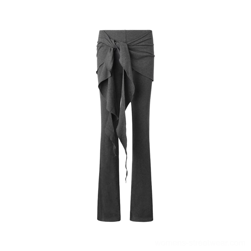 Gray asymmetric wrap drape flare streetwear pants with a relaxed low rise fit and flowing side drape