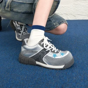 Rear-side view of gray silver and black star panel platform sneakers with thick elevated sole, blue star details, and classic lace-up closure