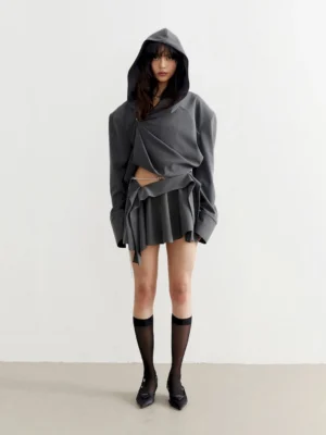 Gray box pleat micro mini skirt with cropped hoodie and black knee high stockings full front Seoul fashion look