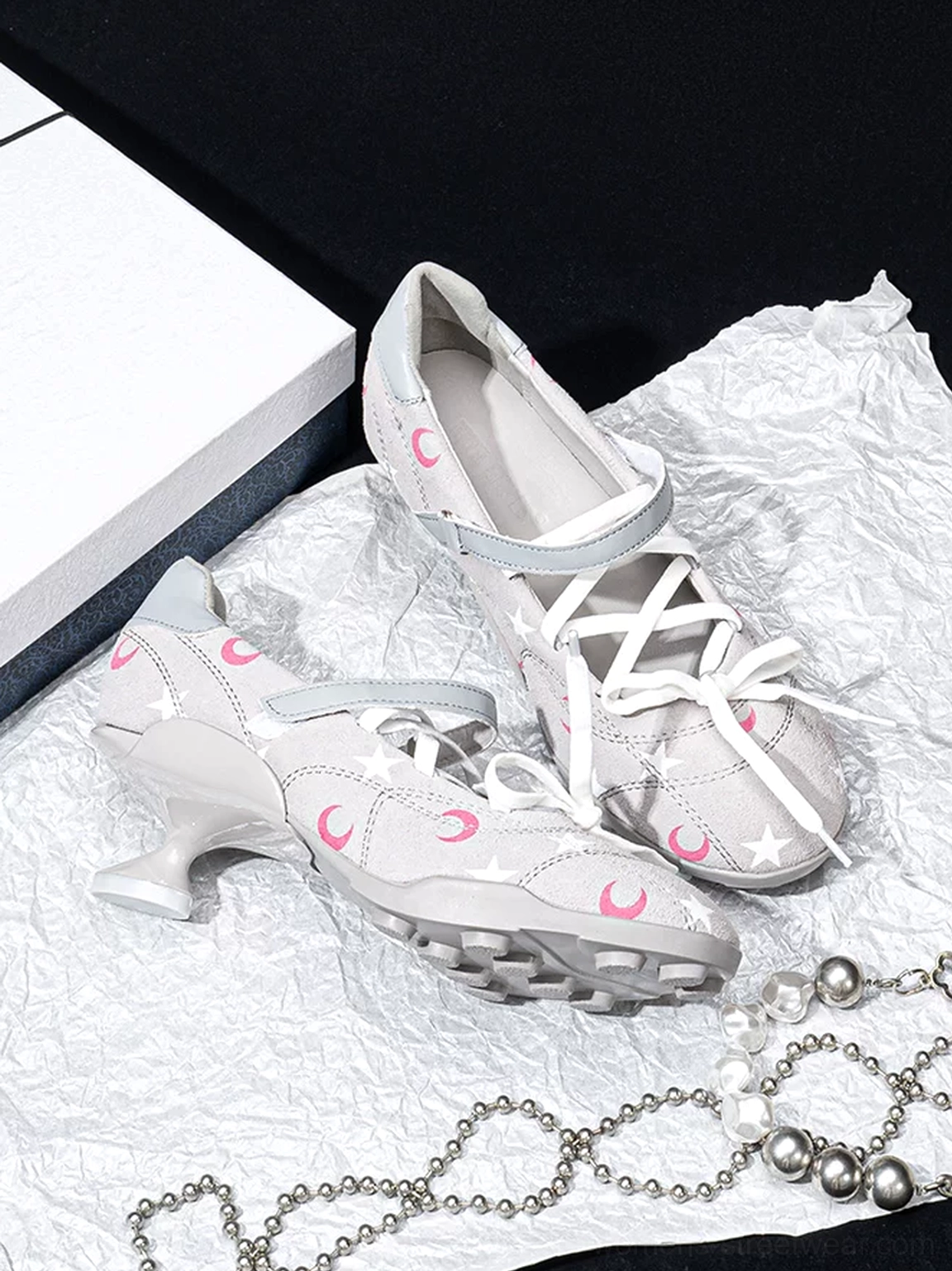 Gray celestial moon star lace-up low-heel sport Mary Janes angled flat lay showing sculpted heel