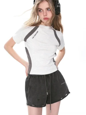 Gray cropped slim fit T-shirt with dark contrast shoulder panels mock neck and small chest lettering