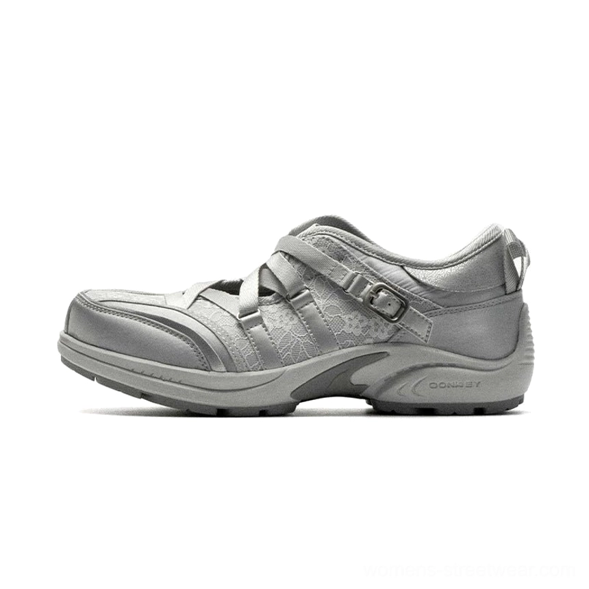 Gray cutout cross-strap casual sneakers with textured fabric upper, adjustable buckle straps, breathable side panels, and stable flat rubber sole