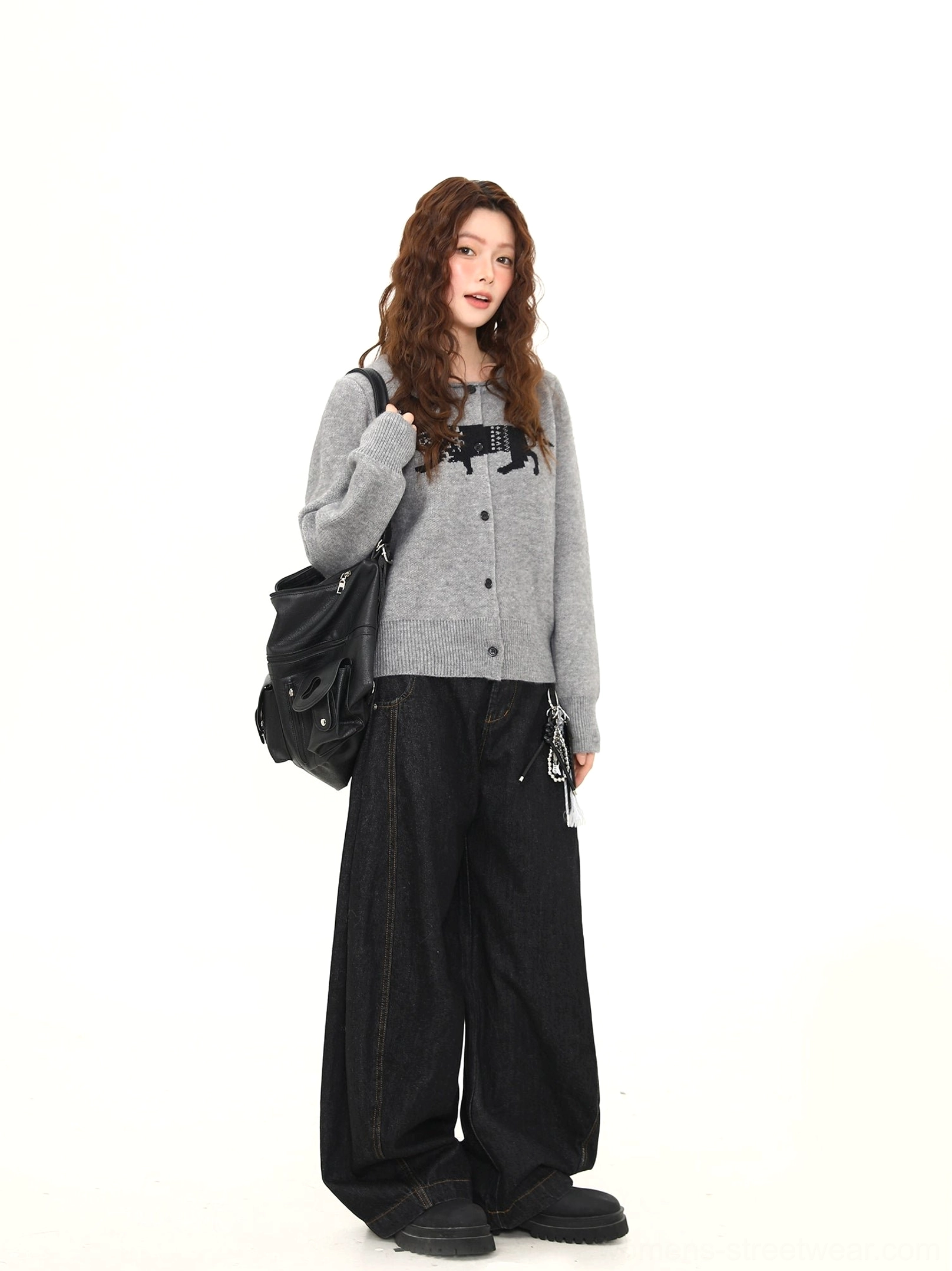 Side view of a relaxed heather gray dachshund print cardigan showing the soft knit texture, dropped shoulders, ribbed cuffs, ribbed hem, and casual streetwear silhouette