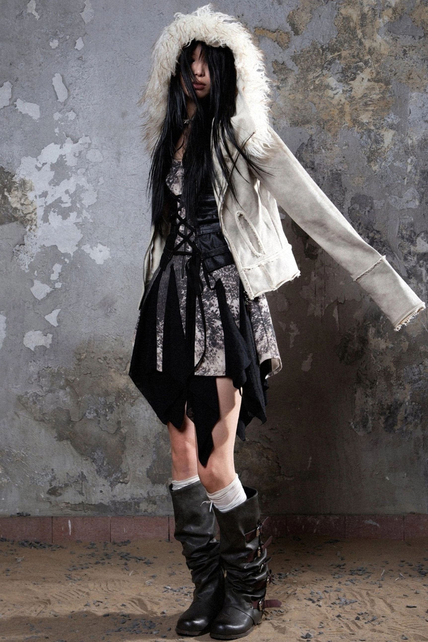 Gray faux fur hooded jacket product image highlighting the fluffy hood trim, relaxed silhouette, and contemporary streetwear design