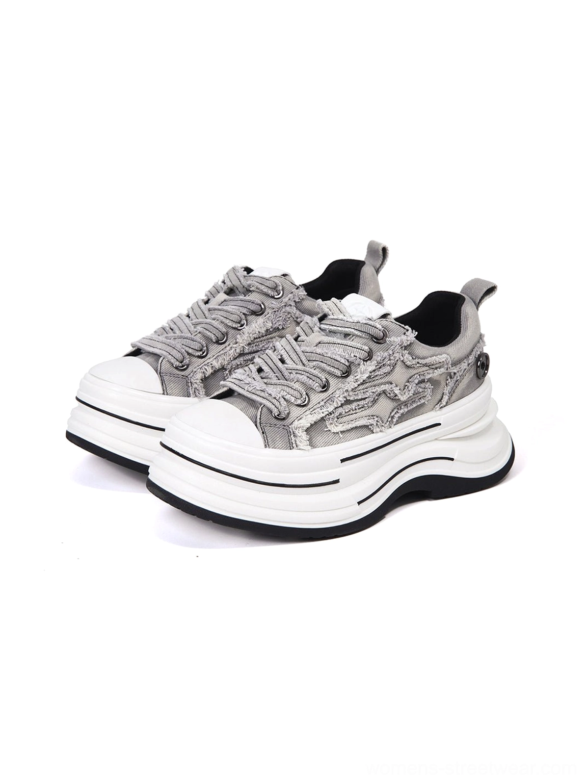 Gray frayed canvas platform sneakers shown in an oblique paired view with black-trimmed dual-layer white sole and distressed upper stitching