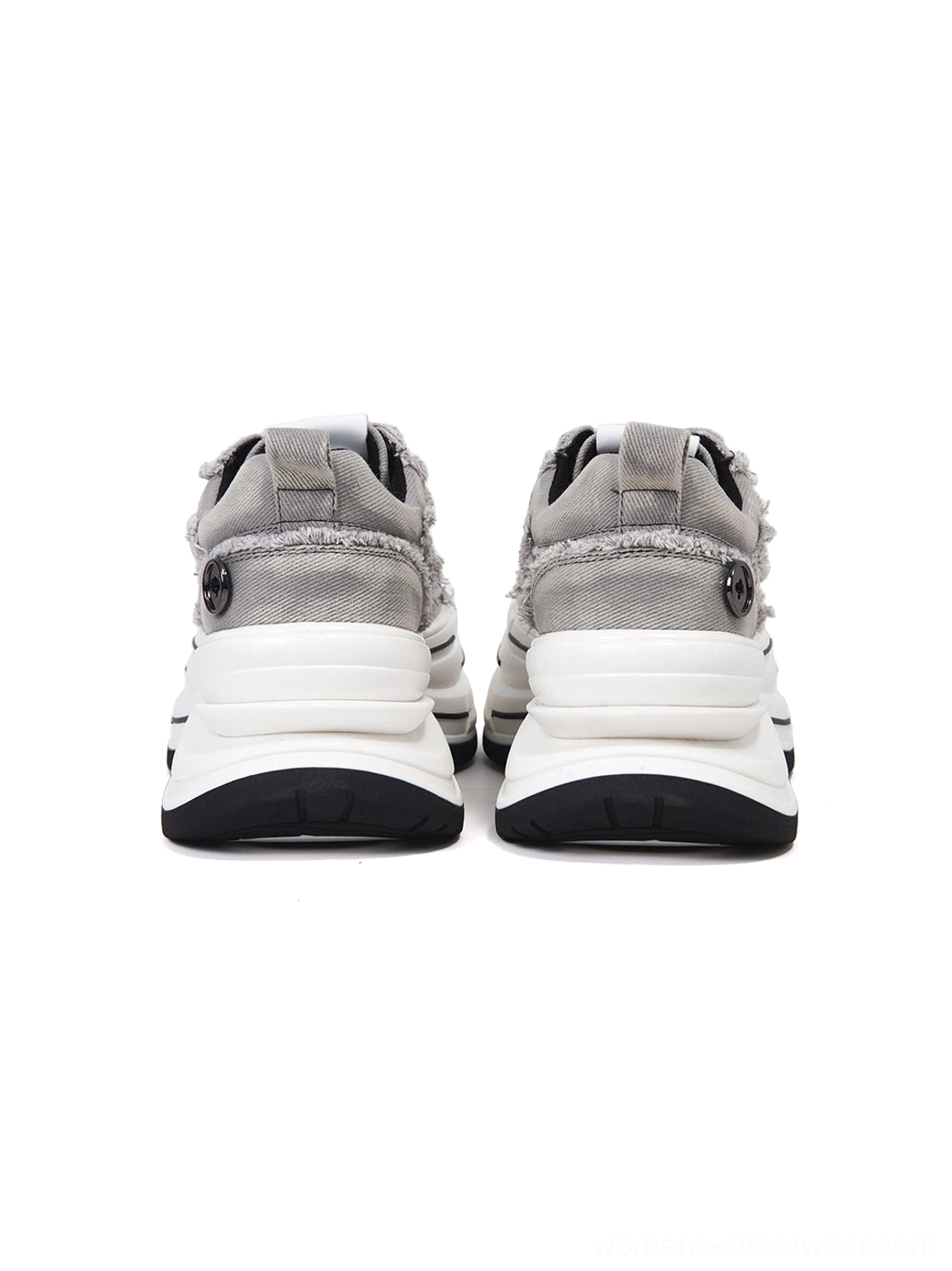Rear top view of gray frayed platform canvas sneakers showing heel counters, layered sole, and black heel accent buttons