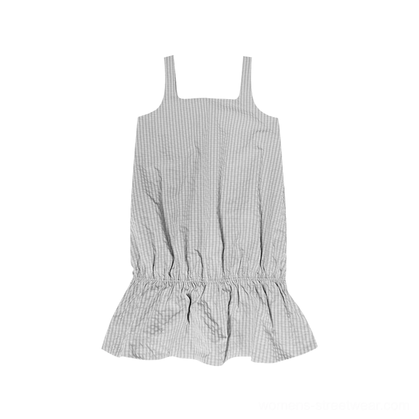 Gray gingham ruffled pinafore mini dress flat lay with lightweight plaid fabric and relaxed A line silhouette