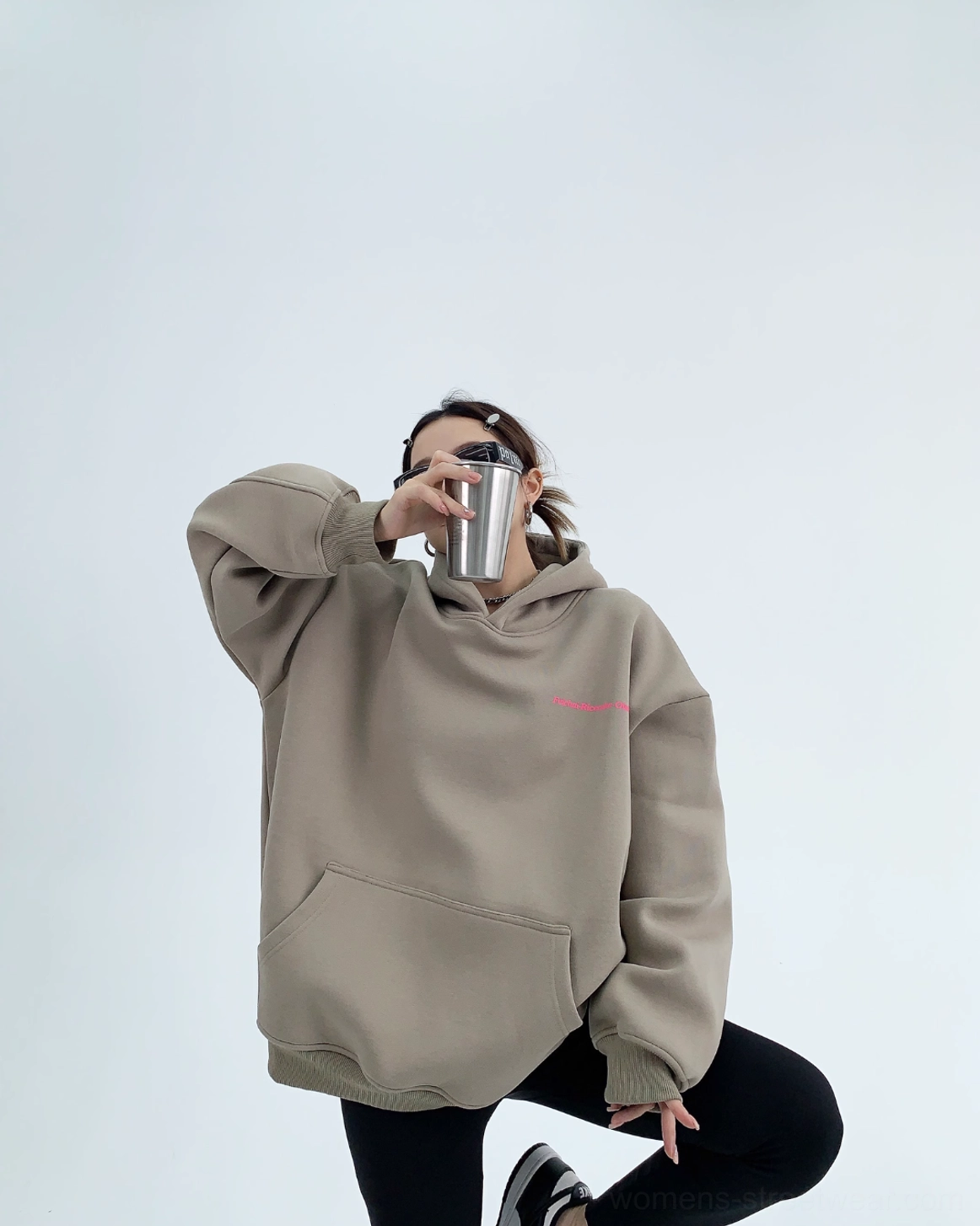 Gray green oversized Korean streetwear hoodie front view with pink chest graphic kangaroo pocket and relaxed silhouette