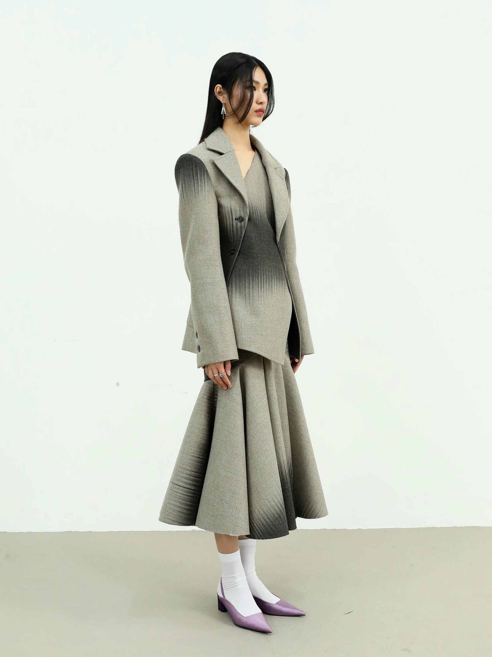 Gray ombre fishtail maxi skirt and cropped blazer set styled with white socks and purple mule heels in contemporary Seoul street style