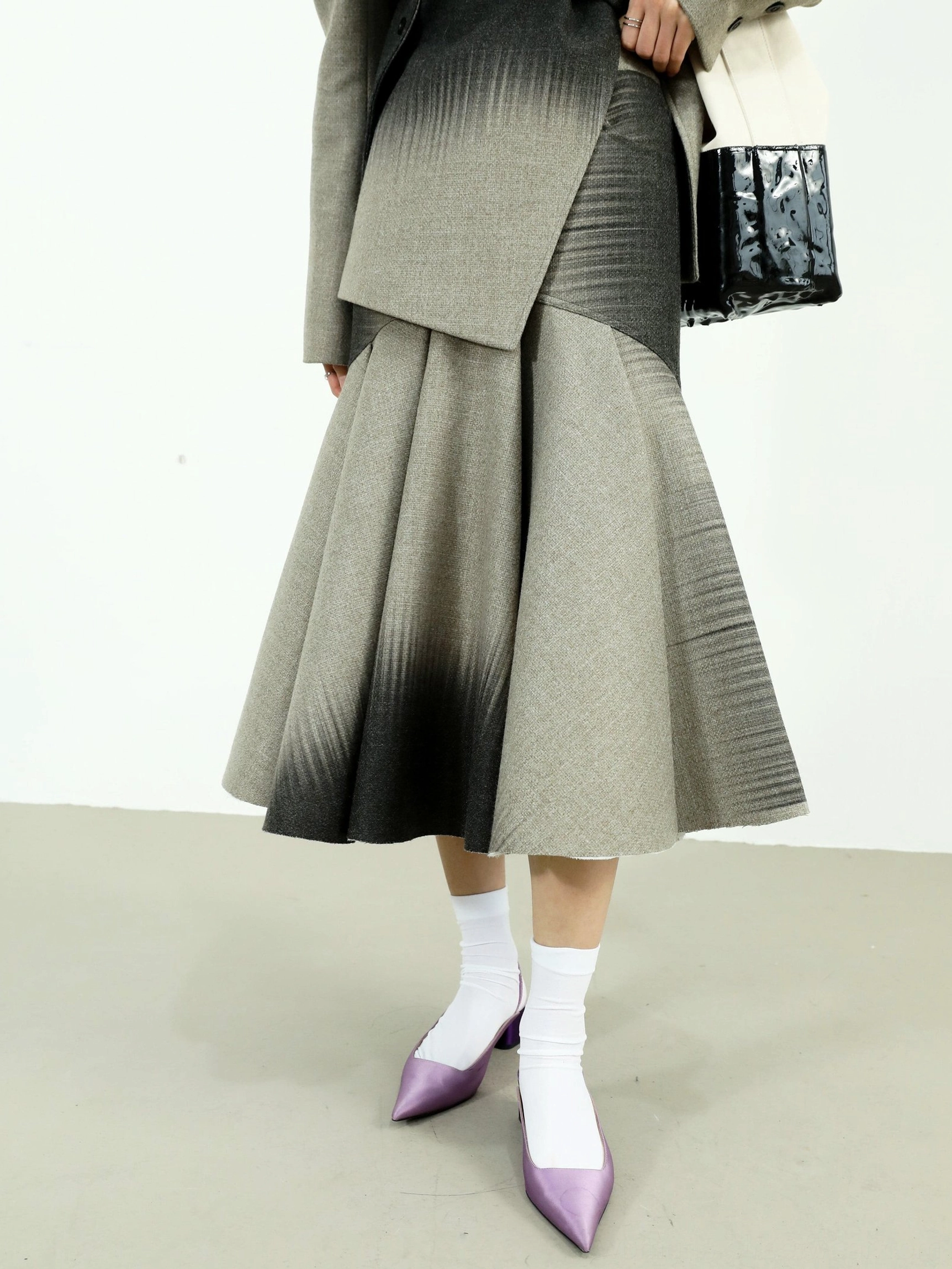 Gray to black ombre fishtail maxi skirt styled with a matching blazer, white socks, purple pointed heels, and a two-tone tote bag in Korean streetwear fashion